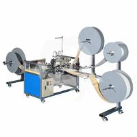 SM-5B  Automatic feed wrapping machine.